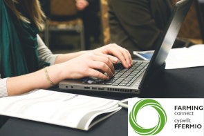 A laptop and a study bookr